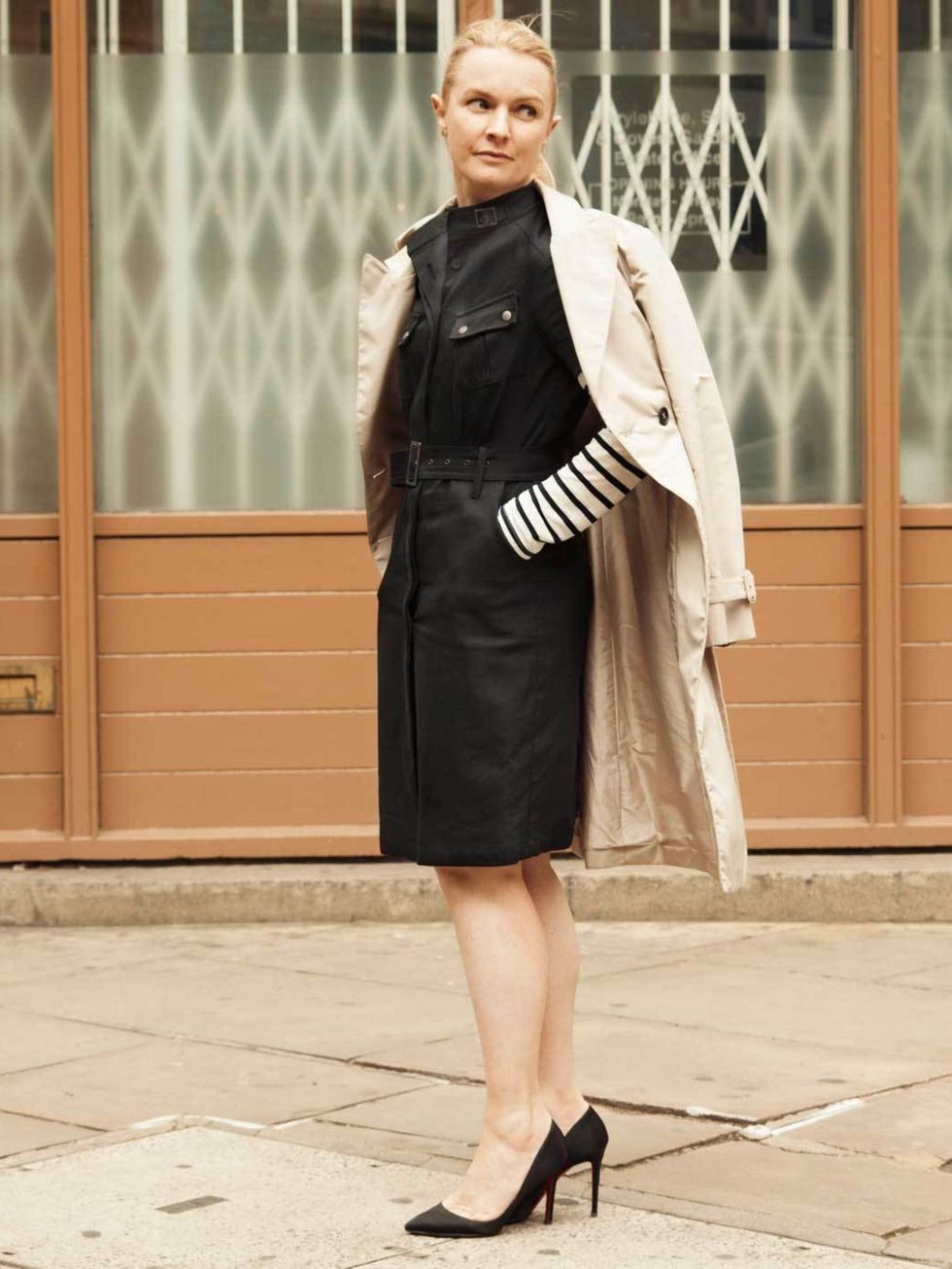 <p>Prada coat, Belstaff dress, Theory top, Christian Louboutin shoes.Photo by Phill Taylor. </p>