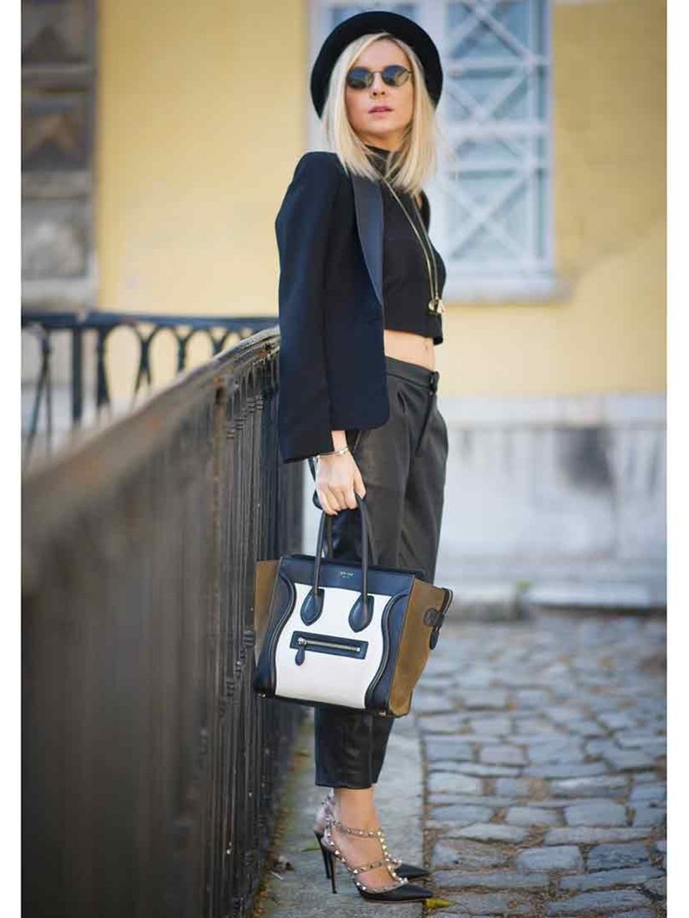 <p>Aysun Karaalioglu is wearing a jacket from Mango, G-Star hat, vintage sunglasses, Celine bag and Valentino shoes </p>