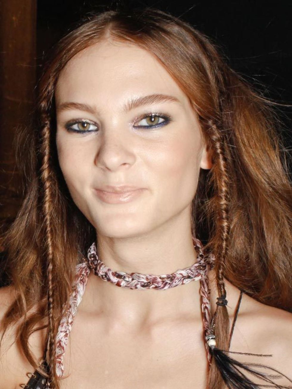 <p>Plaits, rope braids and fishtail plaits all made an appearance on the Milan catwalks. Odile Gilbert masterminded a beautiful summer hairstyle at <a href="http://www.elleuk.com/catwalk/collections/moschino/">Moschino</a> with a plait hairband working it