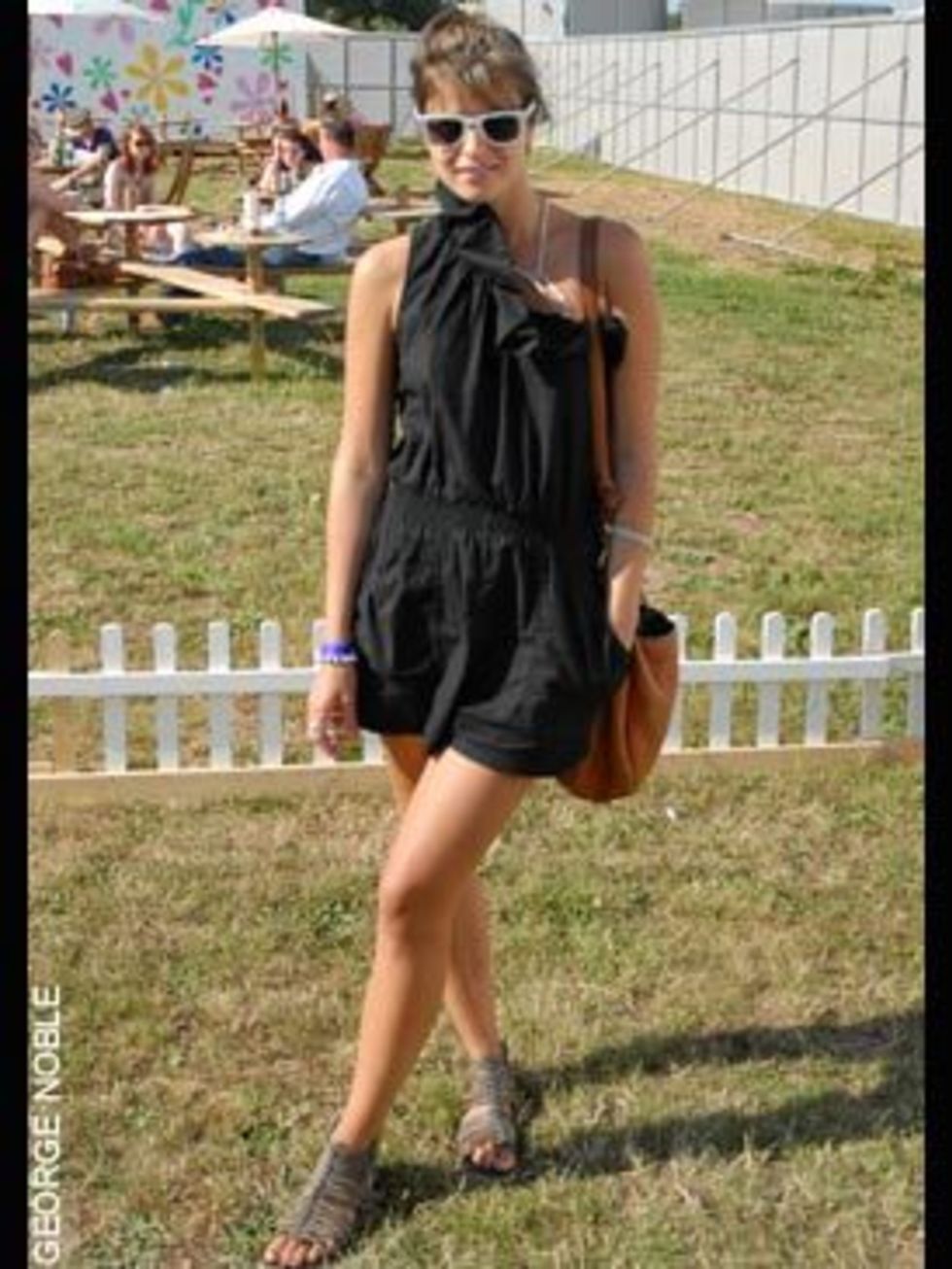 <p>Anne, 21, wearing a Topshop playsuit with shoes from a shop in India</p>