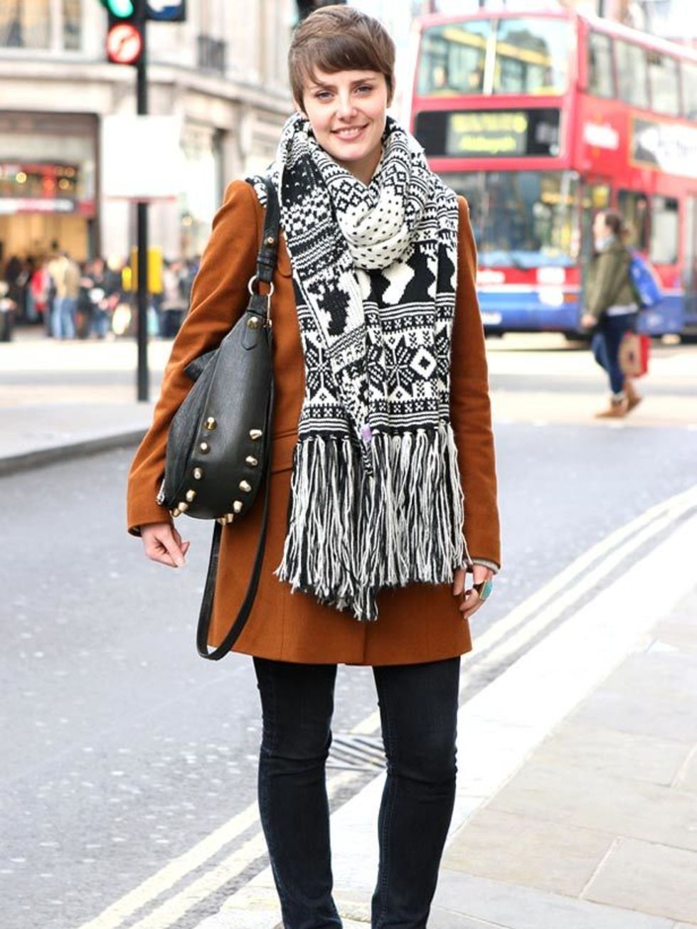 <p>Photo by Anthea Simms.Kira, 24, Product Development. Topshop coat and jeans, River Island scarf and Asos bag.</p>