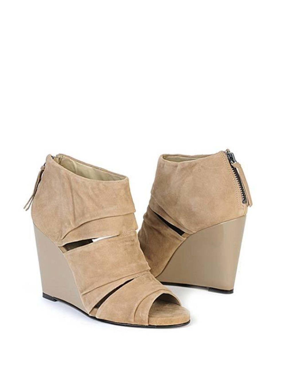 <p>Carvela taupe wedge boots, £140, at <a href="http://www.selfridges.com/en/Accessories/Asterix-ankle-boots-taupe_854-10004-1770447239/">Selfridges</a> </p>