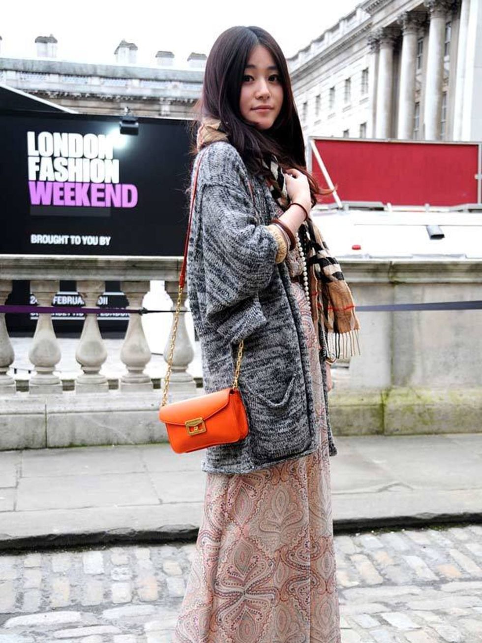 <p>Photo by Ekua King @ Anthea Simms.Shalu, 21, Student. Topshop jumper and dress, Marc Jacobs bag, Burberry scarf</p>