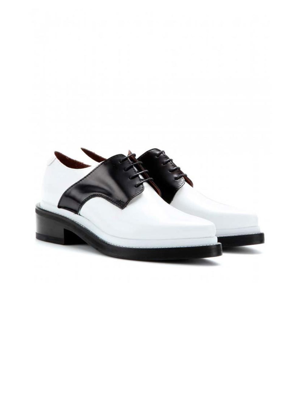 <p>Sharp, slick and graphic monochrome. </p><p>Black and White leather shoes £420 by Acne Studios from <a href="http://www.mytheresa.com/en-gb/lark-leather-oxfords-288678.html">Mytheresa</a></p>