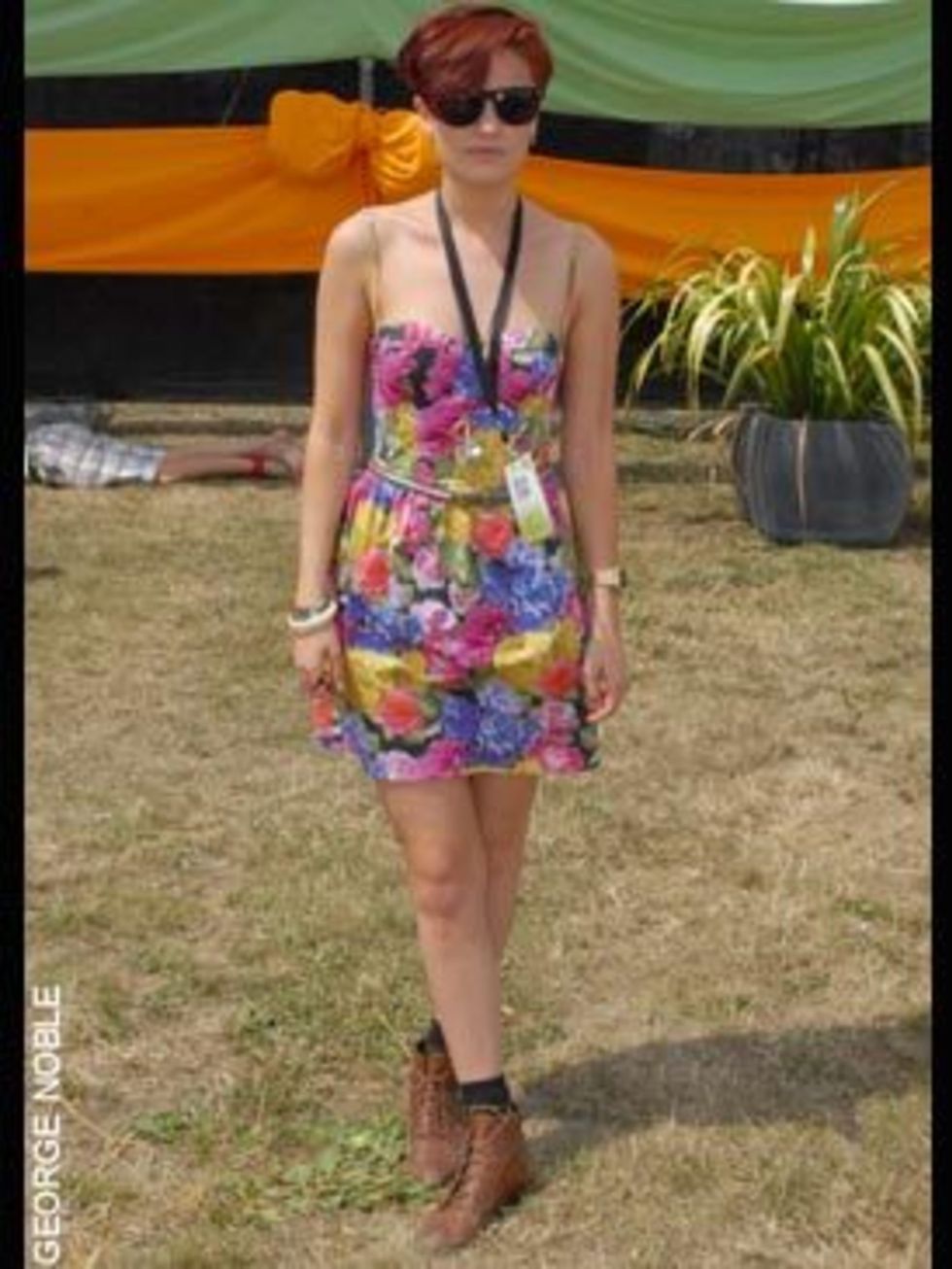<p>Olivia, 21, Press Assistant, wearing a Topshop dress, Office tan boots, sunglasses from Brick Lane Market, a Casio watch and a vintage bangle </p>