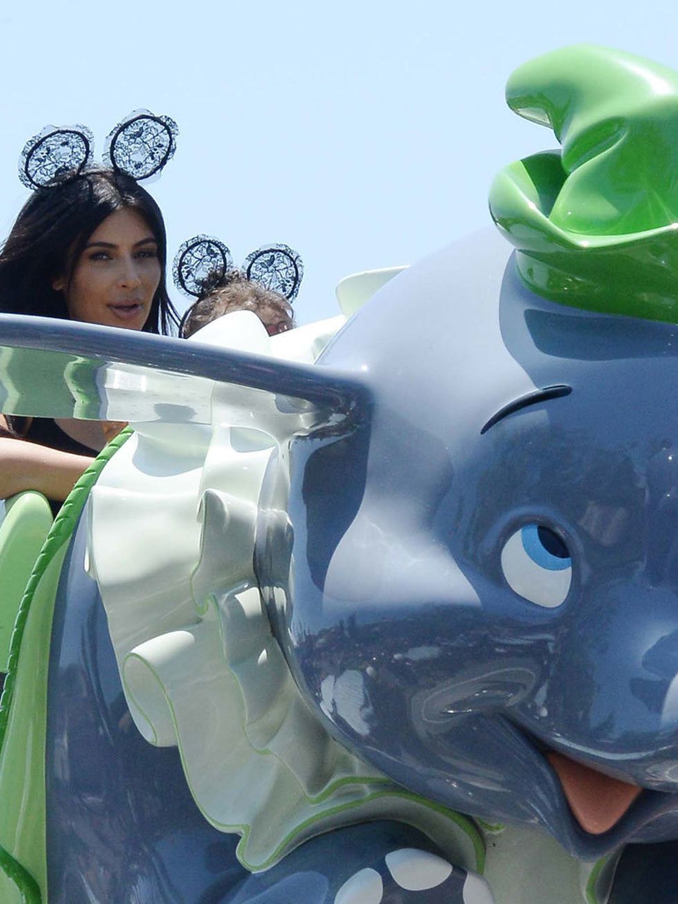 <p>Kim Kardashian and Kanye West take North on the Cars Ride as they are spotted celebrating her 2nd birthday at Disneyland California, June 2015.</p>