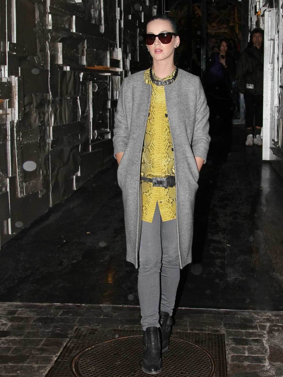 <p><a href="http://www.elleuk.com/star-style/celebrity-style-files/katy-perry">Katy Perry</a> adding a splash of yellow to her look with a snakeskin cardigan while out shopping in Paris, March 2012</p>