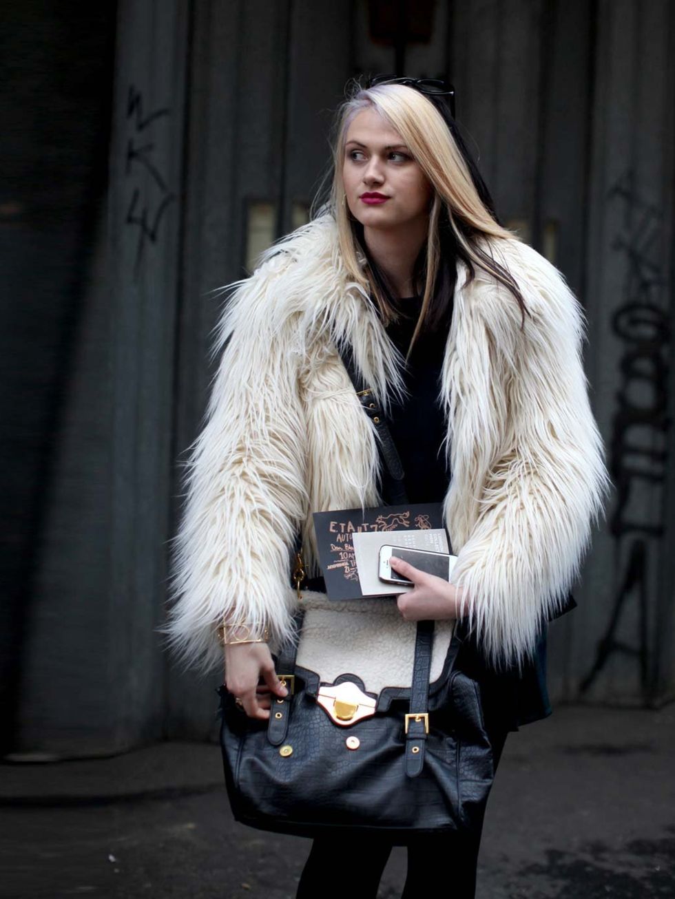 <p>Faux fur and statement bag (uncredited).</p>