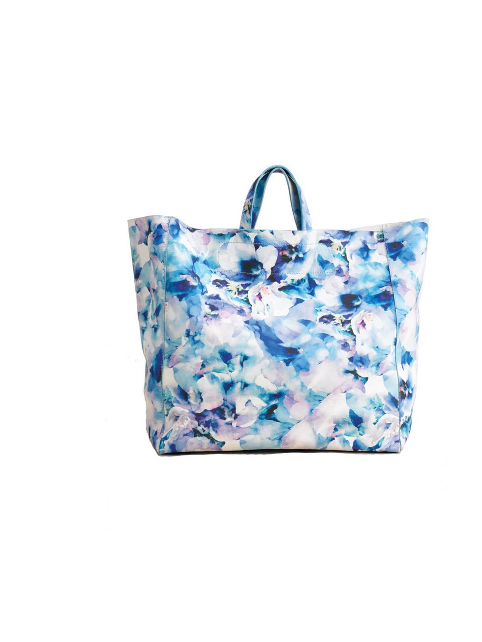 <p>Brighten up any look in a flash with this gorgeous leather tote Taiuti printed tote, £180, at Fenwick, for stockists call 0207 629 9161</p>