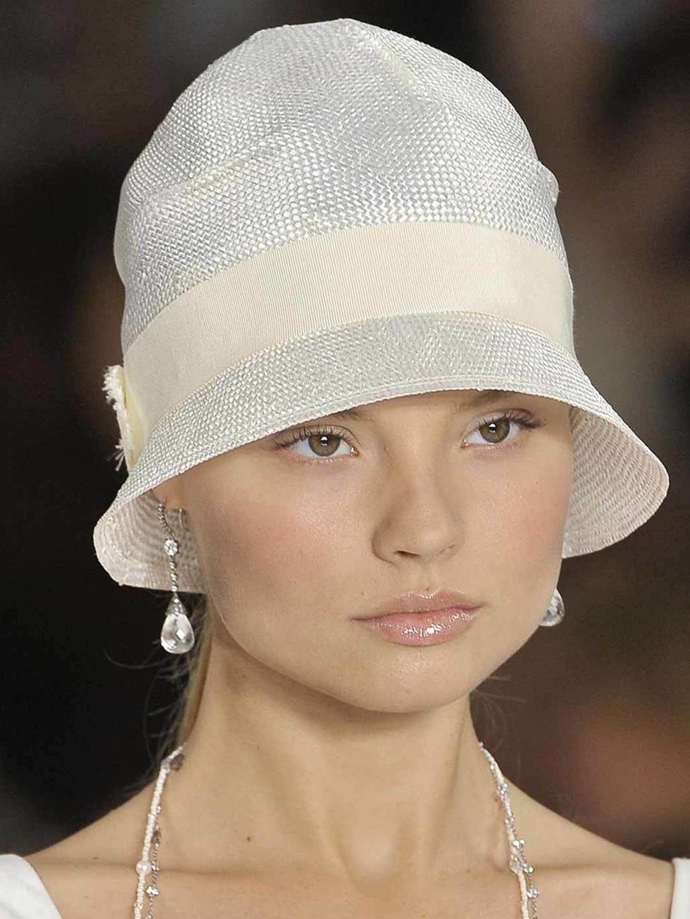 <p>Not just a bad hair day quick fix, the pony is an easy entry point to 20s styling. Plus the perfect partner to a hat or fascinator. <a href="http://www.elleuk.com/catwalk/designer-a-z/ralph-lauren/spring-summer-2013">Ralph Lauren</a> channelled Gatsby