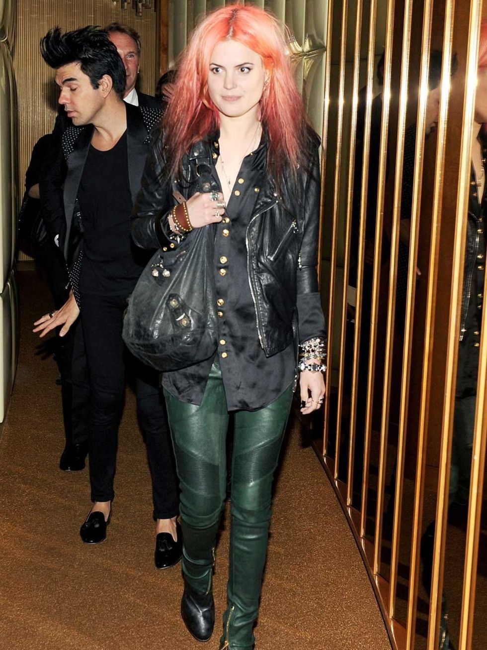 <p>Alison Mossheart wears double leather</p>