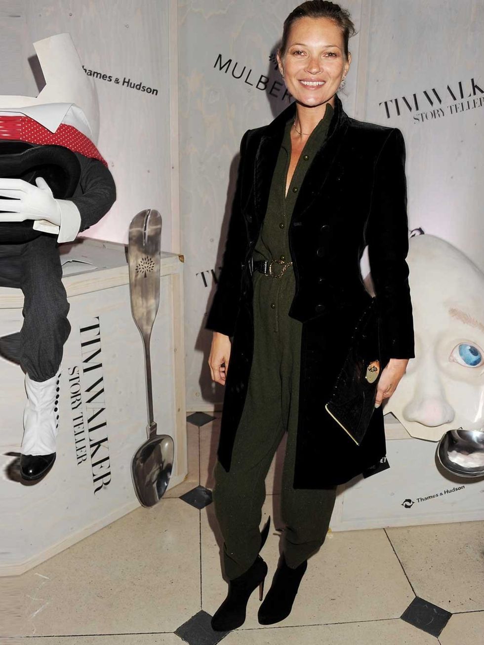 <p>Kate Moss totes a Willow clutch in black alligator from the Mulberry SS13 Collection, at the Tim Walker Story Teller exhibition opening party.</p>