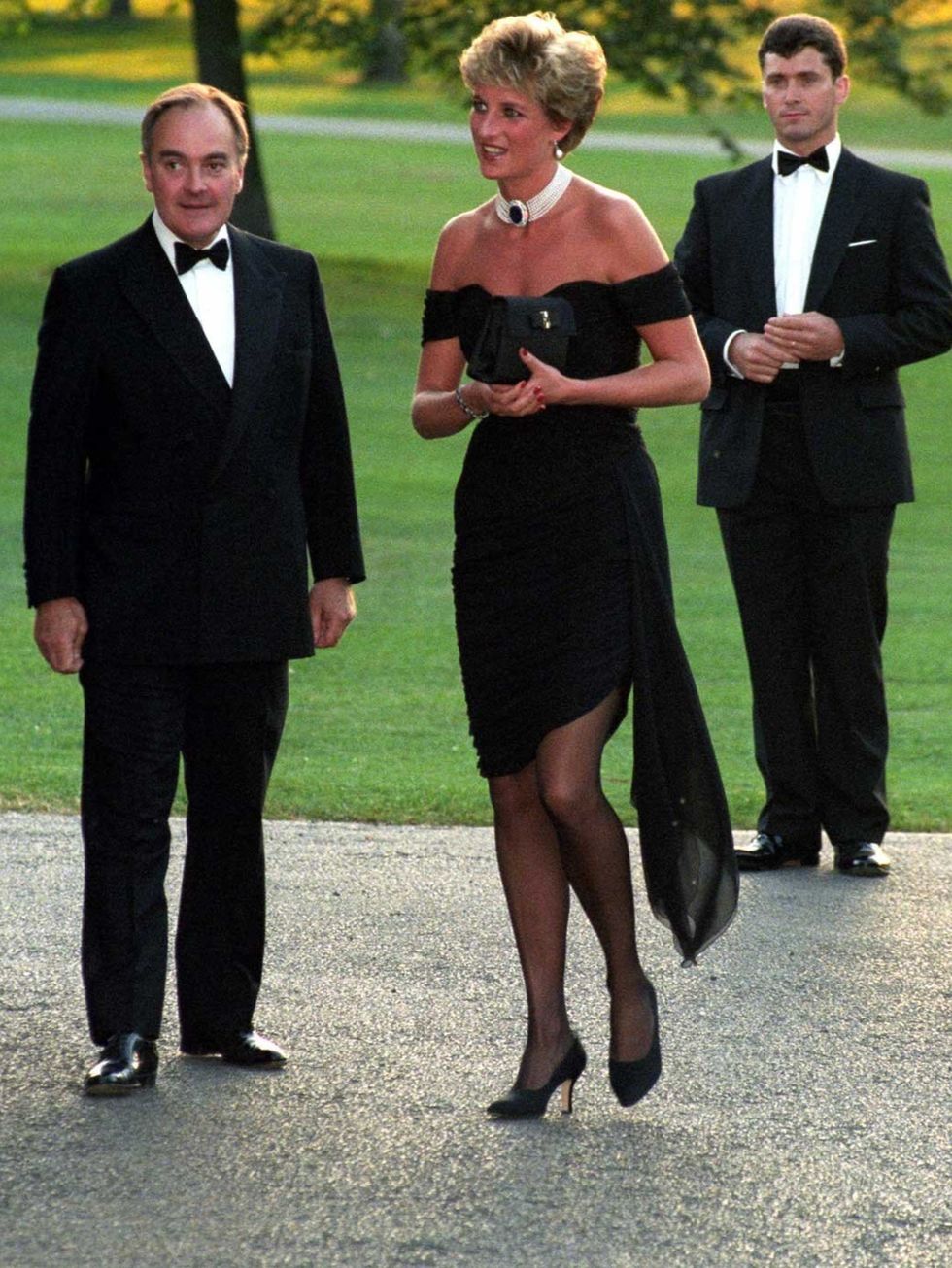 <p>Princess Diana matches her Manolo Blahnik heels with a strapless dress by Christina Stambolian at a charity dinner in 1994.</p>