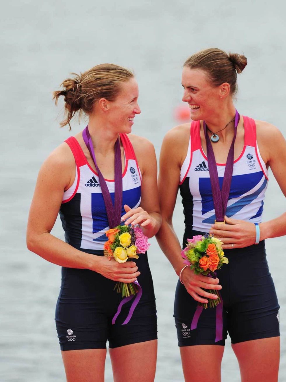 <p>Helen Glover and Heather Stanning wearing the <a href="http://www.elleuk.com/fashion/news/stella-takes-the-title">Stella McCartney Team GB Olympic Kit </a>celebrate their gold medals during the London Olympics, August 2012.</p>