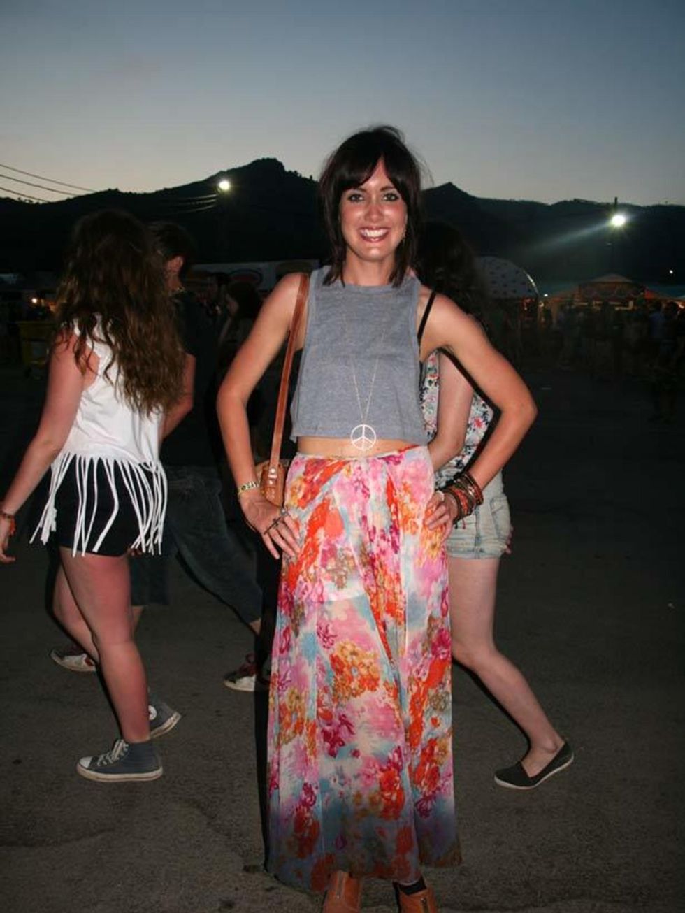 <p>Photo by Sara D'Souza.Caroline, 24, Student. Urban Outfitters top and necklace. Topshop skirt and boots, vintage bag.</p>