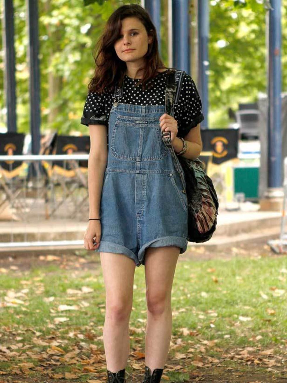 <p>Photo by Anthea Simms.Fabienne, 18, Student. Urban Outfitters dungarees, Dr Marten boots, backpack from Camden market.</p>