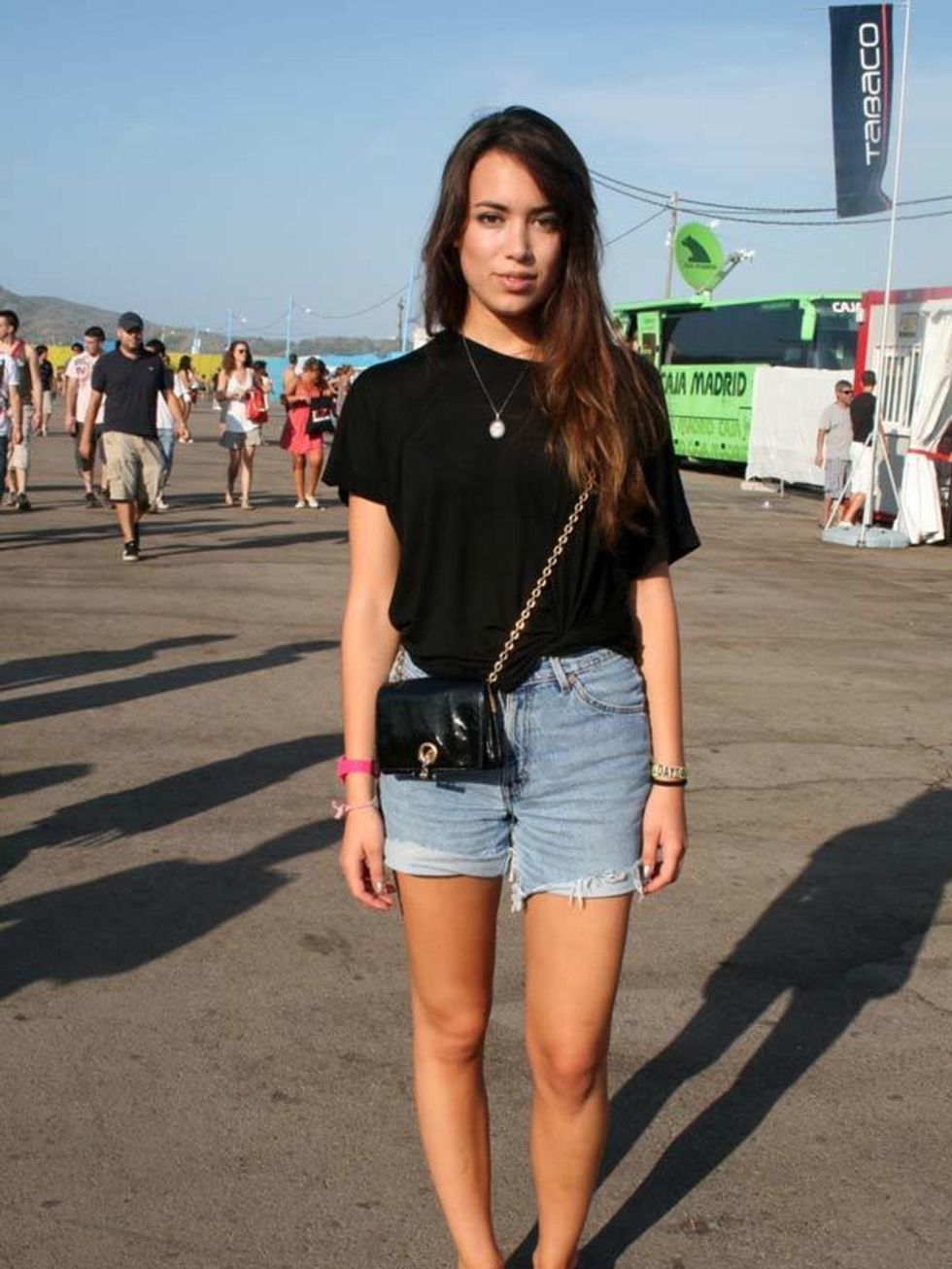 <p>Photo by Sara D'Souza.Andrea, 18, Student. Zara top, vintage shorts, Yves Saint Laurent bag, Primark shoes.</p>