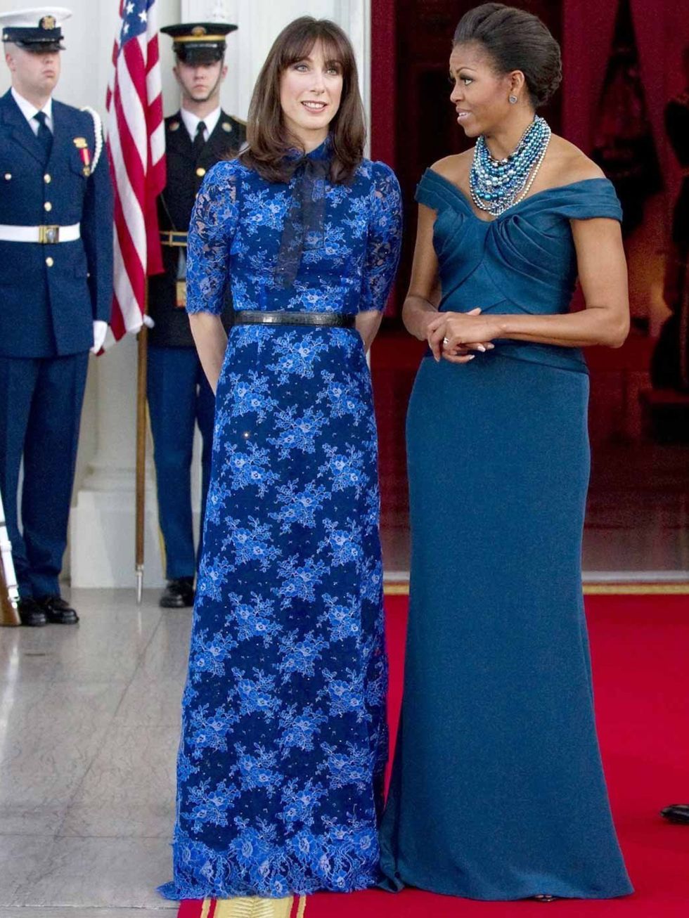<p>Samantha Cameron wearing an Alessandra Rich column gown with Next shoes, stands next to Michelle Obama during a visit in Washington DC, February 2012.</p>