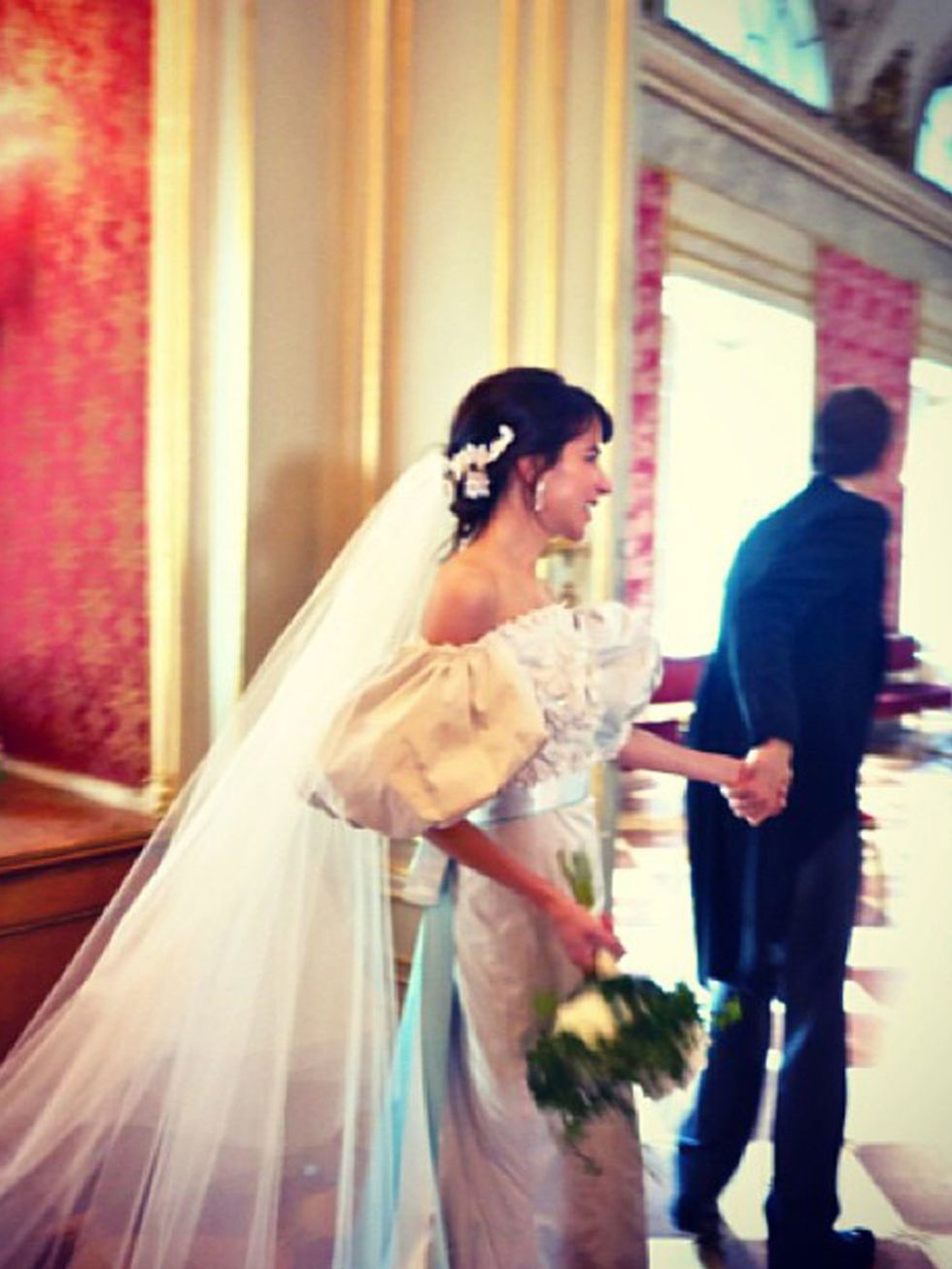 <p>Caroline Sieber wears a <a href="http://www.elleuk.com/catwalk/designer-a-z/chanel/spring-summer-2014">Chanel</a> wedding dress, July 2013.</p><p><em><a href="http://www.elleuk.com/style/occasions/wedding-dress-inspiration-from-spring-summer-2014-fashi