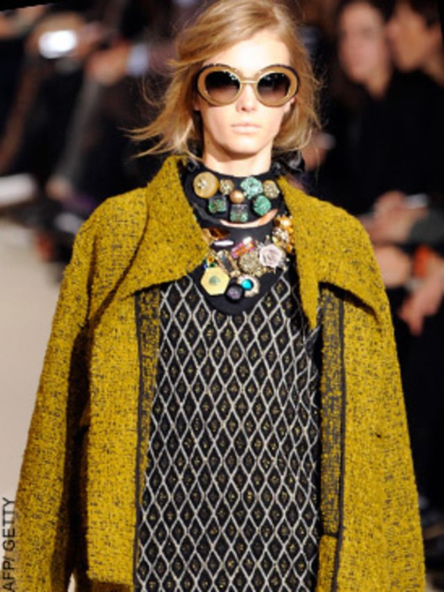 <p>In her latest collection for Marni, fur, pony skin, metallic wool check, floral silk, tapestry quilting, embroideries and rhinestones all came together in her unmistakable, multi layered, mix-and-match style. Beautiful bold neck pieces featured big gol