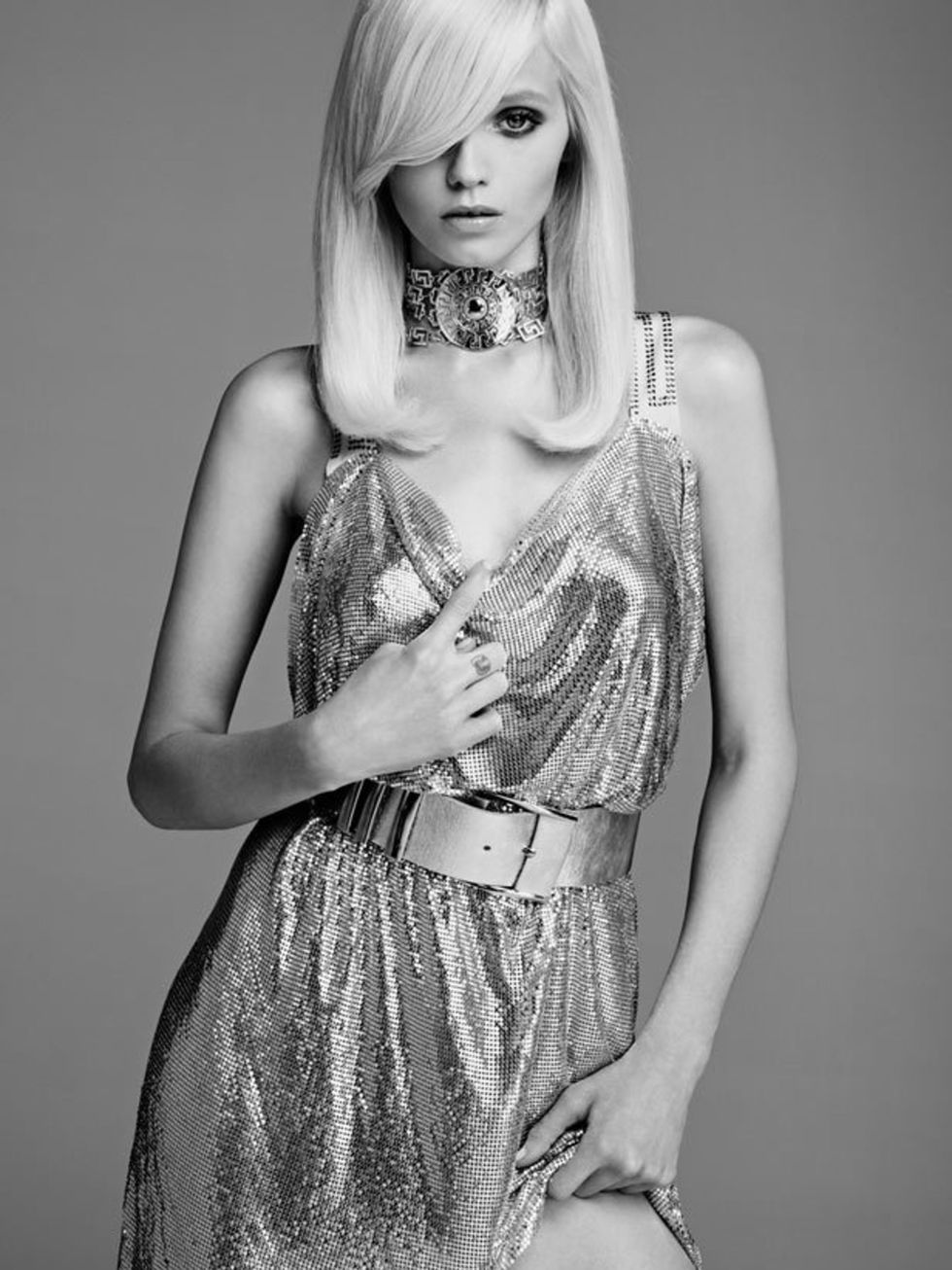 <p>Model <a href="http://www.elleuk.com/content/search?SearchText=Abbey+Lee+Kershaw&amp;SearchButton=Search">Abbey Lee Kershaw</a> wears a metallic dress in the <a href="http://www.elleuk.com/catwalk/collections/versace/">Versace</a> for <a href="http://w