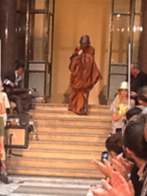 <p>Vivienne Westwood descends for her finale wearing a shroud</p>