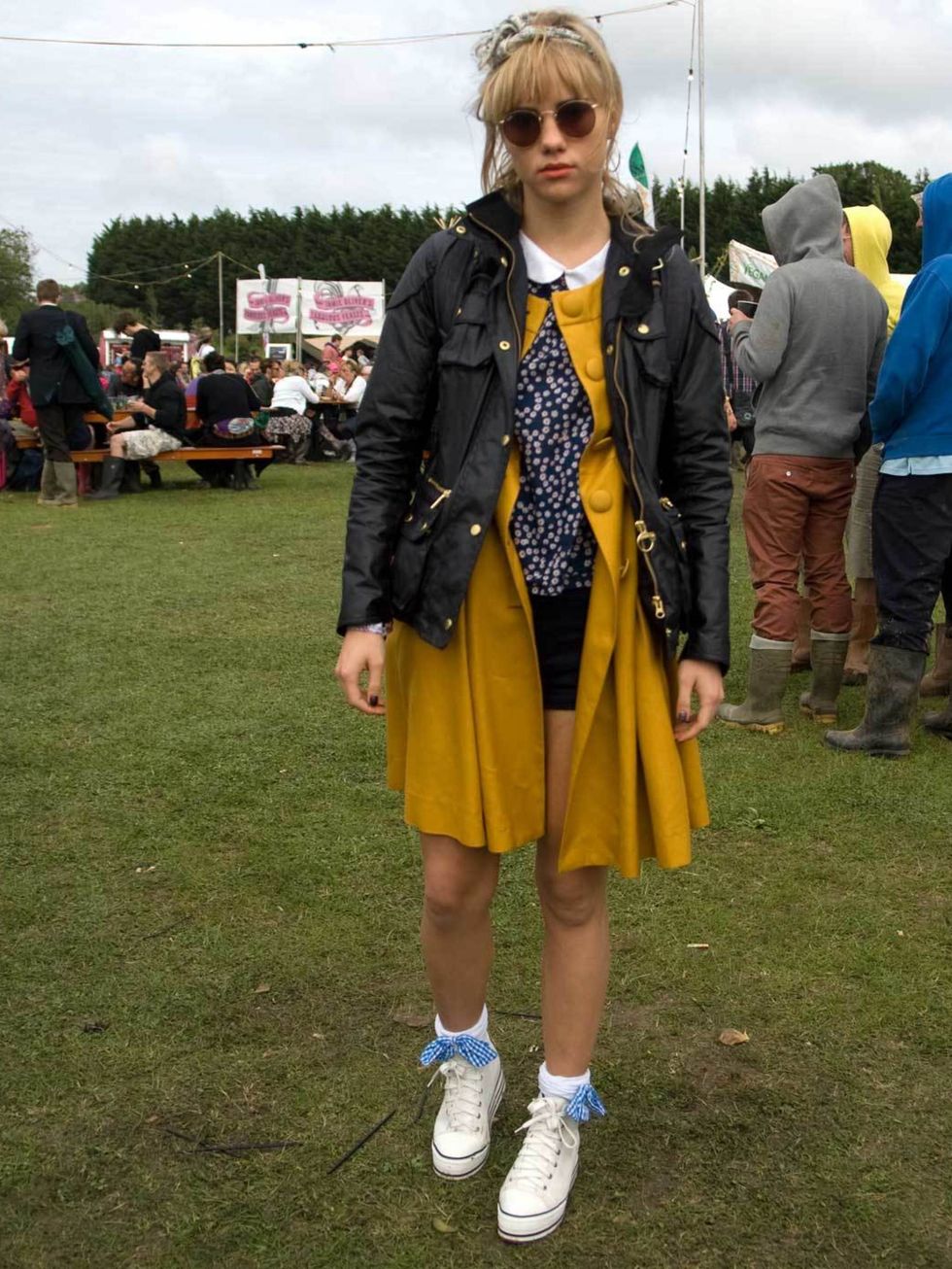<p>Suki Waterhouse, 20, Model. Barbour jacket, Orla Kiely coat, Maje top, Vintage shorts, Converse shoes, Ray Ban sunglasses.</p><p>Photo by Tim Knowles</p>