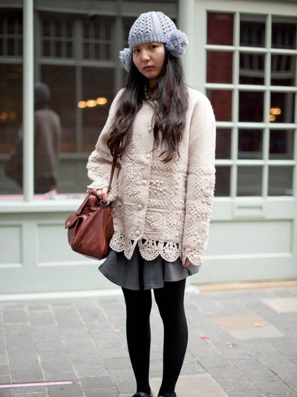 <p>Photo by Kirstin SinclairRan Age, 21, Student. Vintage cardigan and shirt, skirt and hat from China, shoes from Japan, Topshop bag.</p>