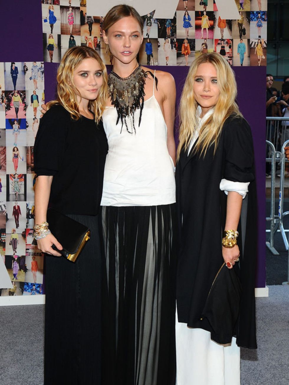 <p>Mary-Kate Olsen, Sasha Pivovarova and Ashley Olsen all wearing The Row</p>
