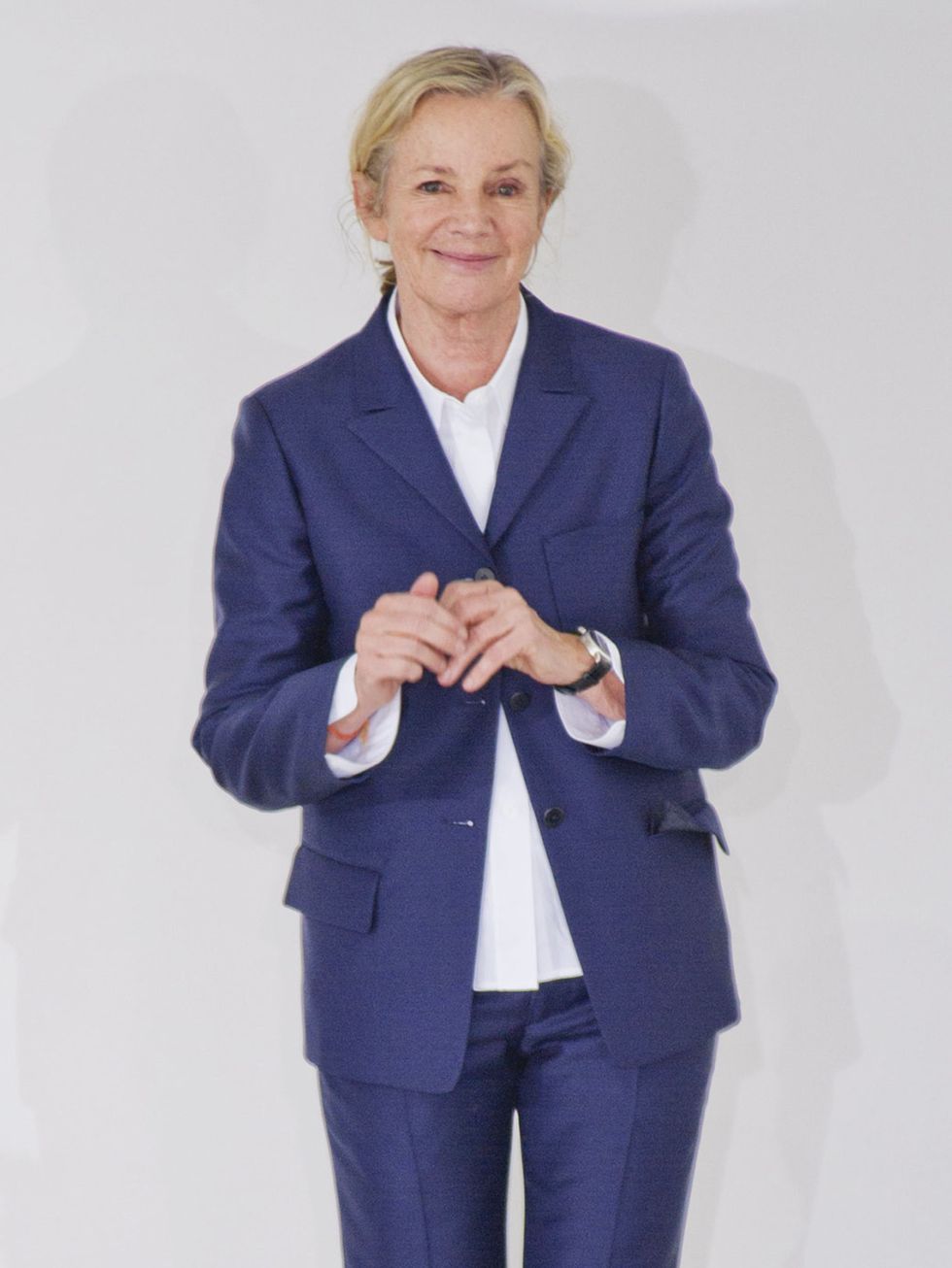 <p>Jil Sander taking her bow at the end of the catwalk show during Milan Fashion Week</p>