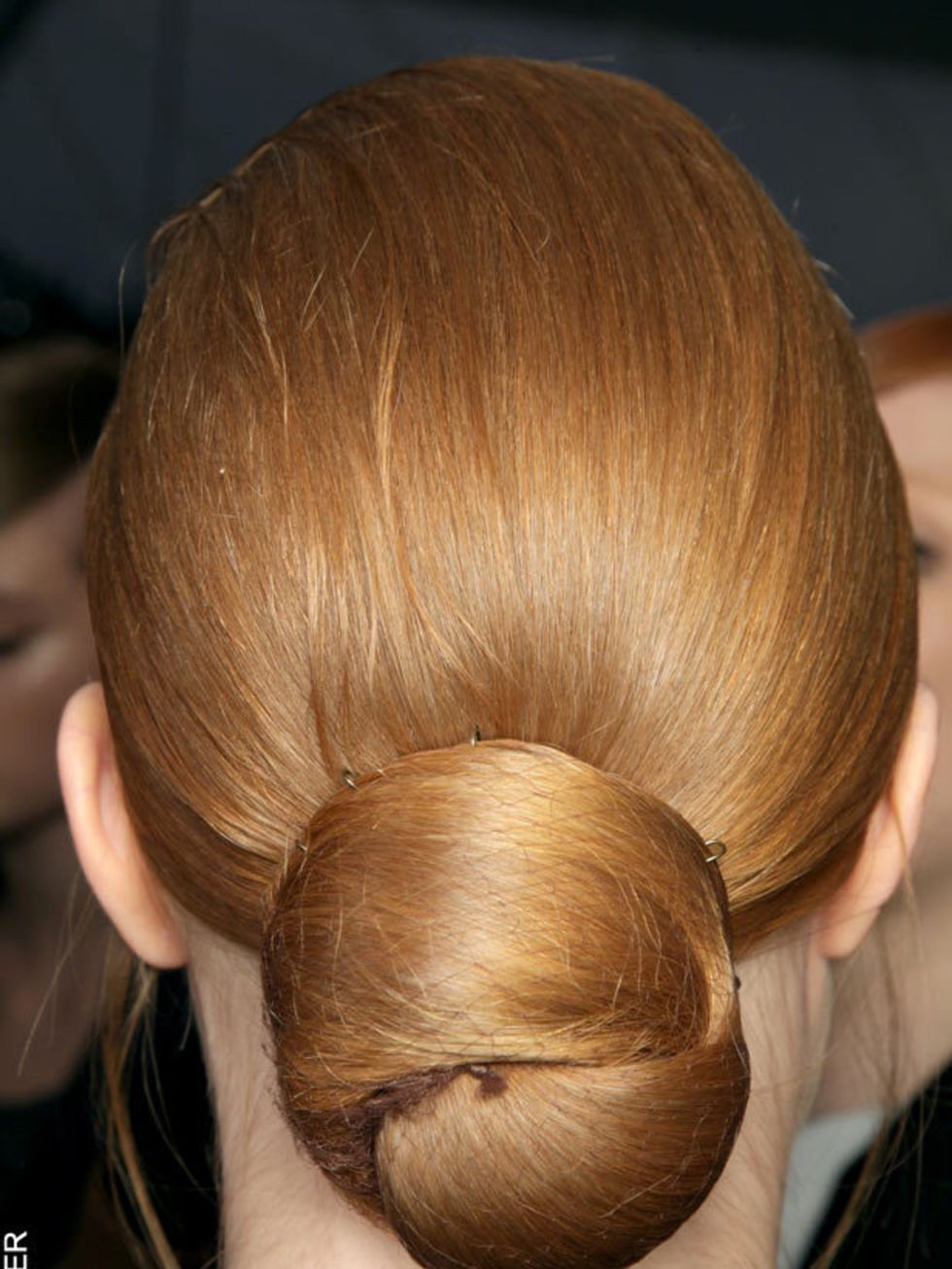 <p>A perfect workwear style, this take on the classic up-do was a popular choice. Our favourite incarnations were at Alberta Ferretti and <a href="http://www.elleuk.com/catwalk/collections/donna-karan/autumn-winter-2011">Donna Karan</a> where the topknot 