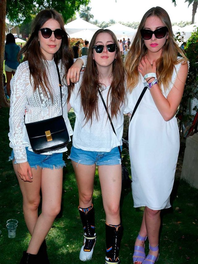 <p>The Haim sisters at the Lacoste Beautiful Desert Pool Party</p>