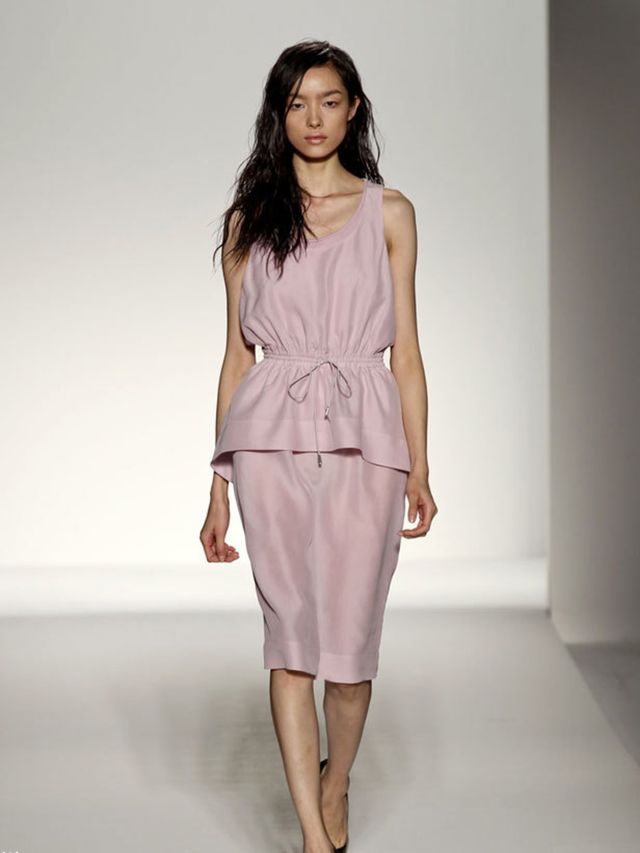 <p>There was a sporty, feminine vibe to the collection. Simple, clean tunic tops were belted over long tailored shorts and pencil skirts, lightweight shirt dresses were gathered with drawstrings at the waist and pretty plisse pleat dresses were worn under