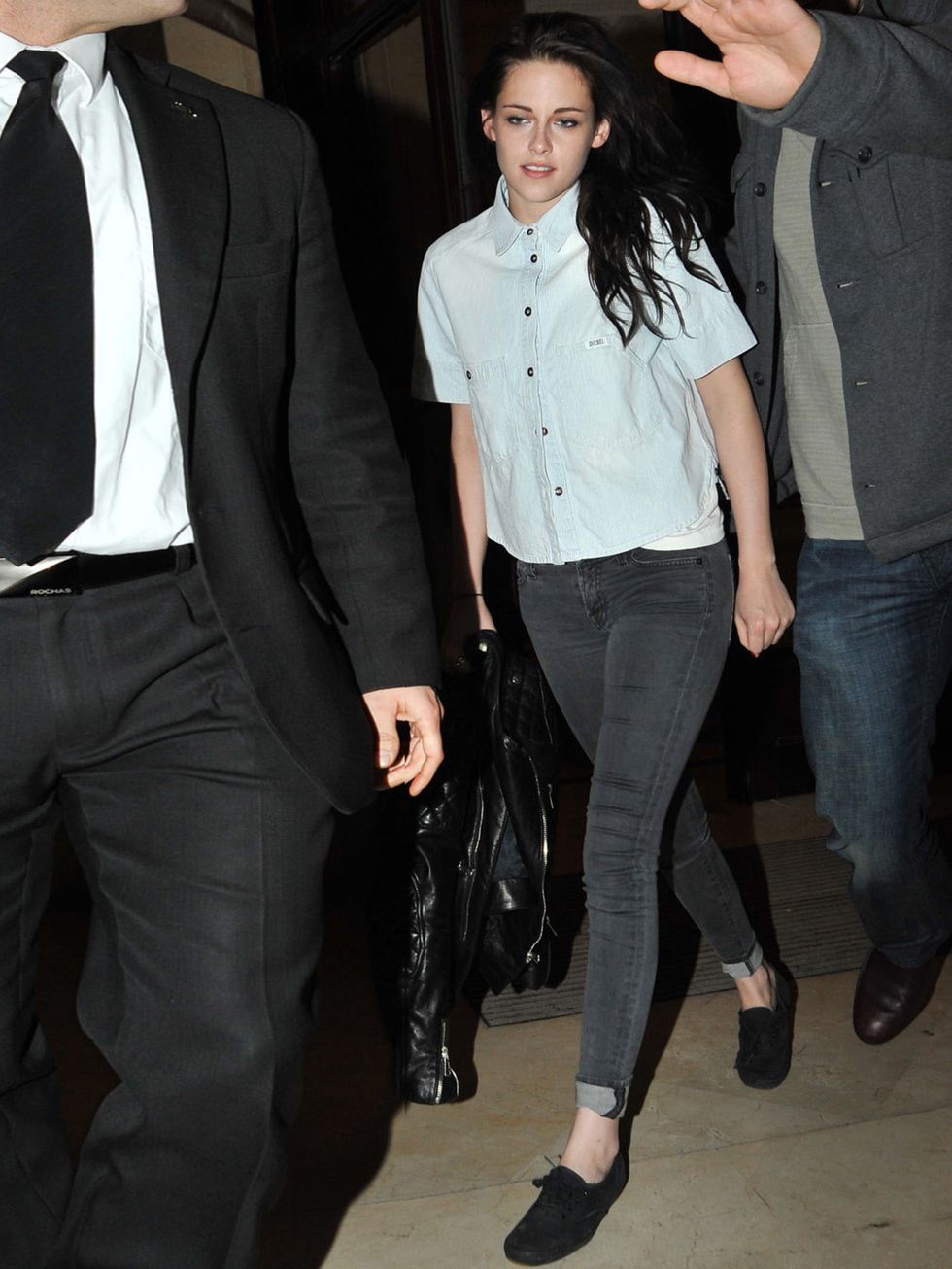 <p>Kristen Stewart wearing Diesel. The actress is in a pale blue button down shirt. The actress is our June cover star.</p>