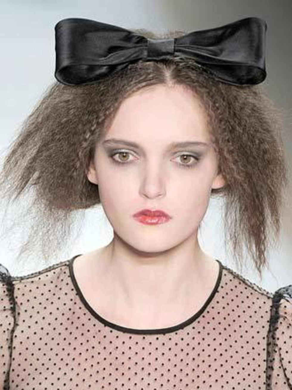 <p><strong>The Wild Bunch</strong>At hip designer Erin Fetherston hair was crimped and teased to recreate the eighties look of Londons new romantics. For Marc Jacobs too, hairstylist Guido took a trip back to the bad taste decade, creating a variety of a