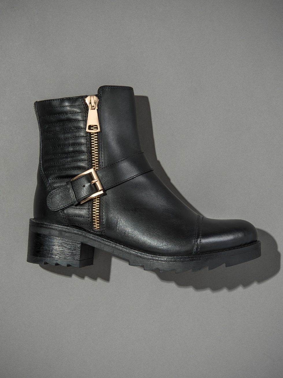<p><a href="http://www.dunelondon.com/poloma-shark-sole-quilted-leather-biker-boot-0092508770002484/?utm_source=Elle-Magazine&utm_medium=Gallery&utm_content=Poloma-Black&utm_campaign=Elle-360">Poloma</a> - £115</p>