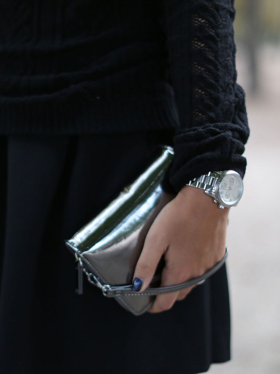 <p>Silver metallic watch seen at Paris Fashion Week</p>