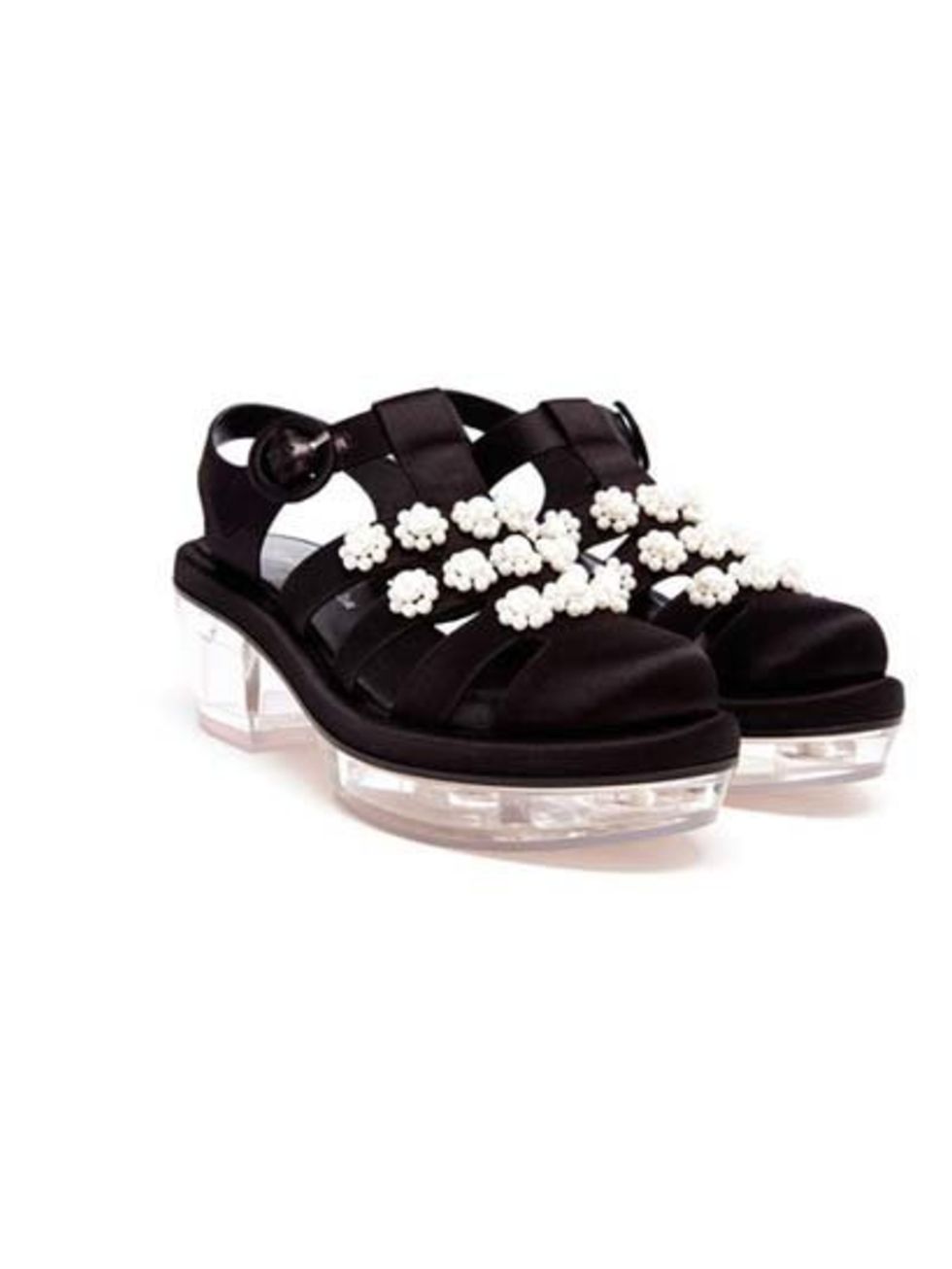 <p>Perspex and satin sandals with Simone's floral pearl embellishment, are £915 at <a href="http://www.brownsfashion.com/product/038S52740003/027/pearl-embellished-satin-sandals">Browns</a>.</p>
