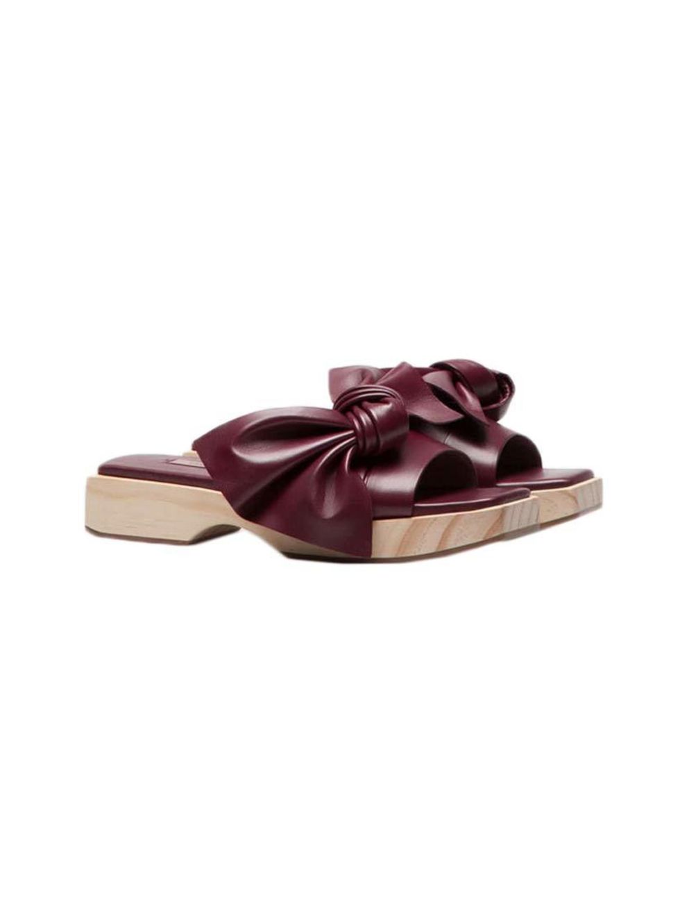 <p>A statement sandal will breathe new life into a tried-and-tested summer wardrobe of blue jeans and white t-shirts.</p>

<p><a href="http://www.uterque.com/gb/en/new-in-store/wooden-sandals-with-bow-c96511p5659003.html?color=021" target="_blank">Uterqüe