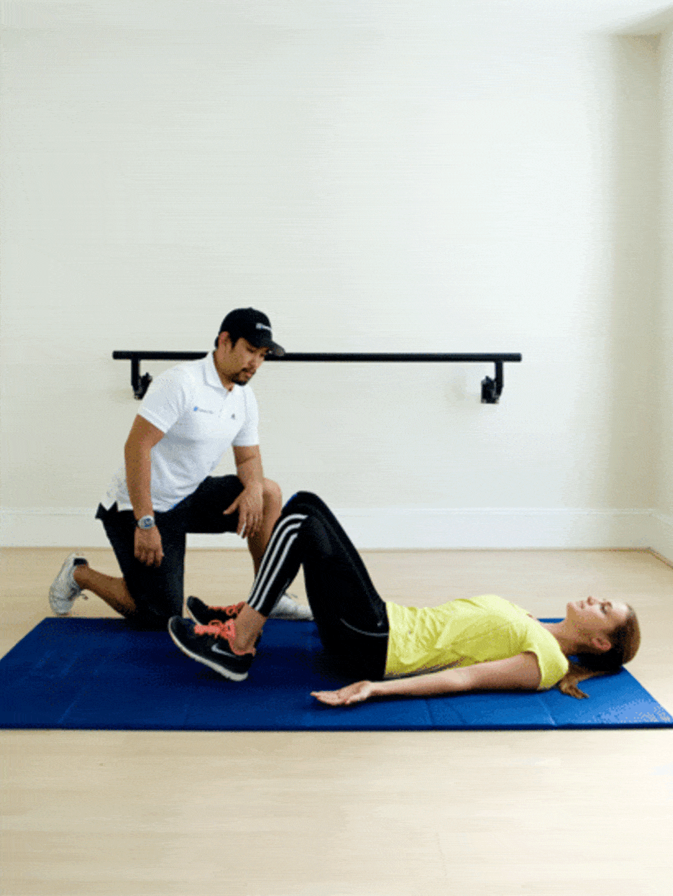 <p><strong>Hip Extension</strong></p><p> Lie on your back with your head resting on the floor. Keep your arms stretched out by your sides with your palms facing the sky. Bend your knees and put your weight on your heels, toes off the ground.</p><p></p><ol