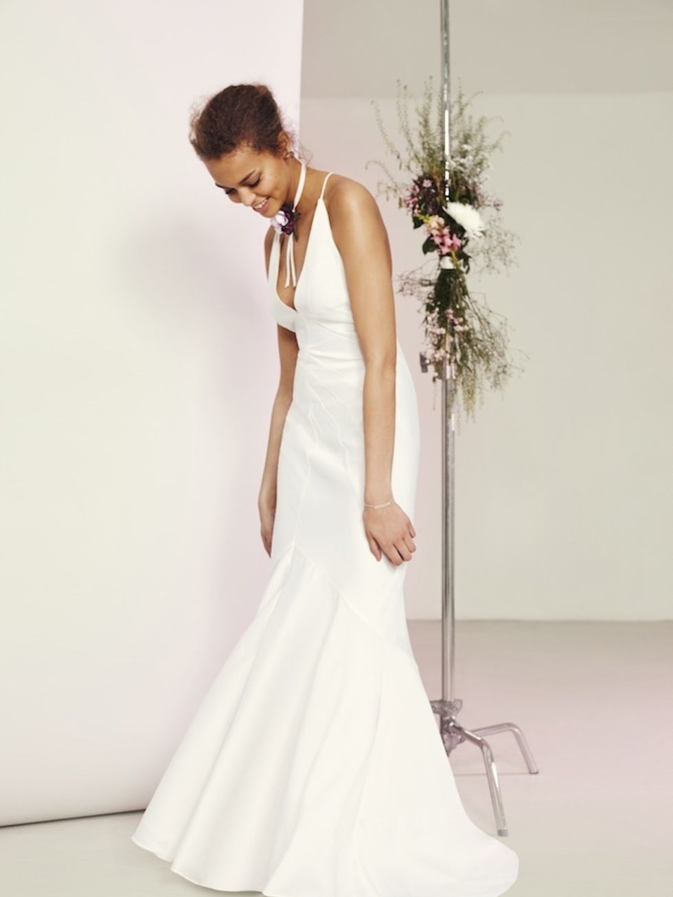 <p>Deep plunge strappy fishtail maxi, £95, <a href="http://www.asos.com/ASOS/ASOS-BRIDAL-Deep-Plunge-Strappy-Fishtail-Maxi-Dress/Prod/pgeproduct.aspx?iid=5911920&cid=2623&sh=0&pge=0&pgesize=36&sort=-1&clr=White&totalstyles=398&gridsize=3" style="line-heig