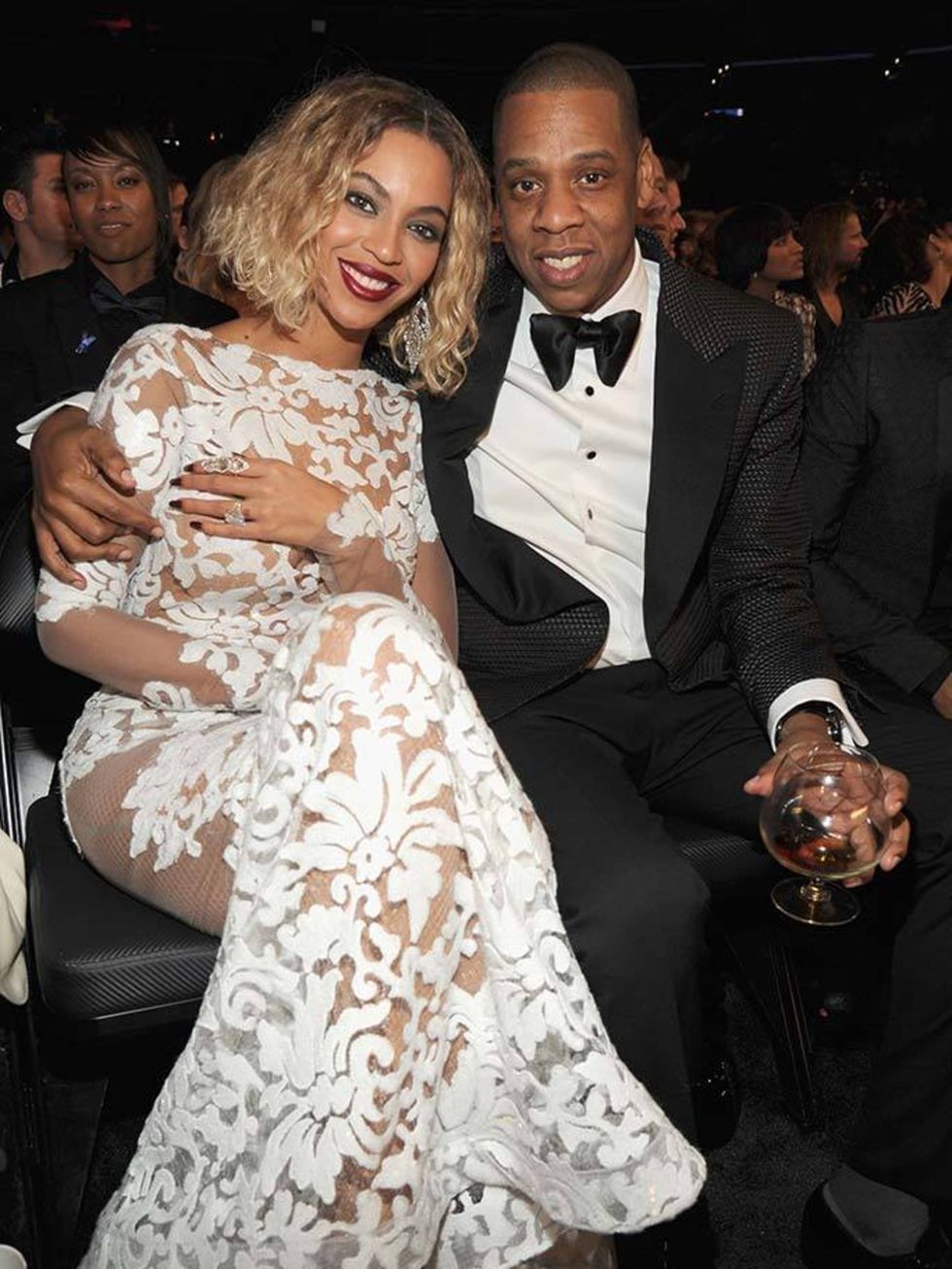 <p>Jay Z and <a href="http://www.elleuk.com/star-style/celebrity-style-files/beyonce">Beyoncé</a>, wearing a Michael Costello dress, post-performance at the 56th Annual Grammy Awards.</p>
