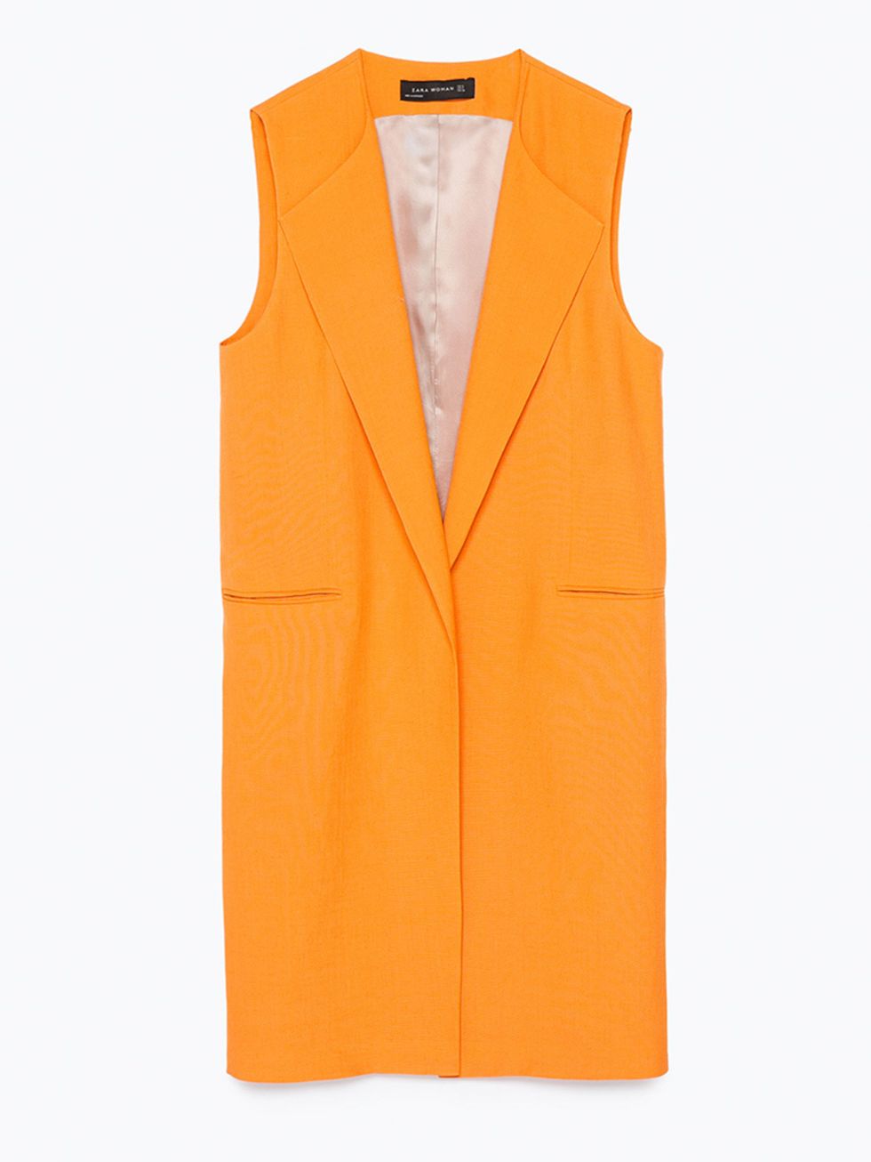 <p><a href="http://www.zara.com/uk/en/woman/jackets/view-all/long-waistcoat-c719017p2649523.html" target="_blank">Zara</a> yellow sleeveless jacket, £69.99</p>