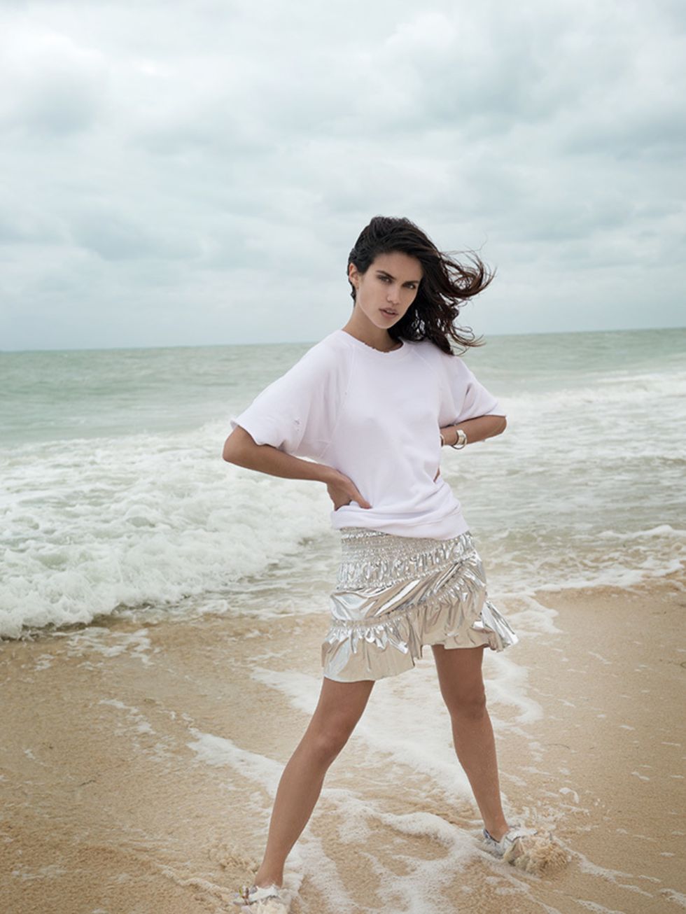 <p>Cotton top, £125, Citizens of Humanity. Cotton skirt, £250, Isabel Marant. Leather sandals, £540, Chanel. Bracelets, from left: Sterling silver and gold, £275, Pandora. White-gold-plated brass, £308, Ekria. Sterling silver, £225, Allison Bryan</p>