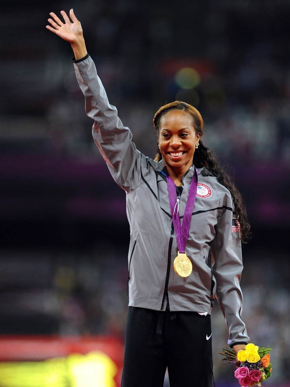 <p>Sanya Richards-Ross wins a gold medal for the Women's 400m during the London Olympics, August 2012.</p>