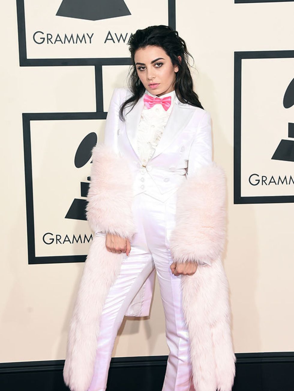 <p>Charlie XCX, in Moschino, attends the 57th Annual Grammy Awards in LA.</p>