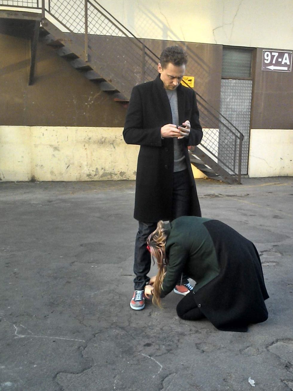 <p>Fashion Assistant Molly adding a last-minute touch to Tom's look.</p><p><em>'In the end, you will always kneel'</em></p>