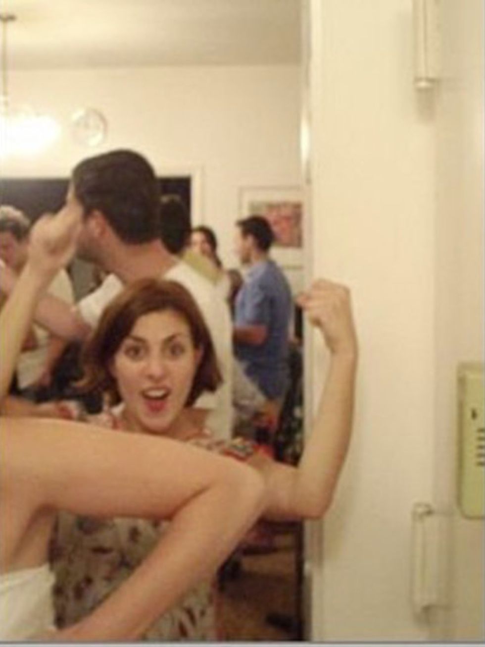 <p>Christina Simone, Workflow Director </p><p>March 13, 2008 at a party in Williamsburg, Brooklyn. Flexing my guns, as usual. </p>