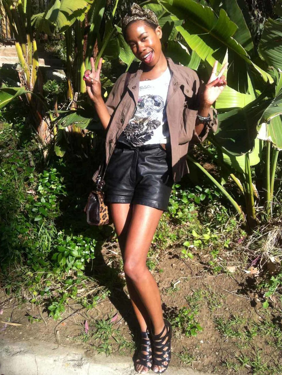 <p>Tolula Adeyemi wears an All Saints smock top and tee with leather shorts at Coachella.</p>