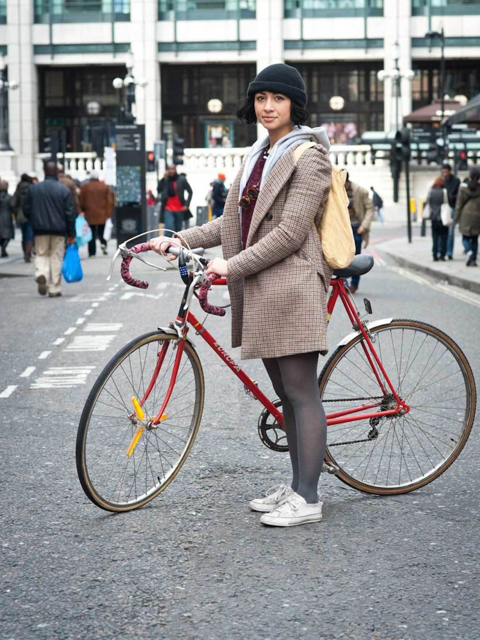 <p>Ella, 22, Creative. Europa bike, Zara coat and shorts, American Apparel hoody, Urban Outfitters jumper, customised Converse trainers, charity shop hat and glasses.</p><p>Photo by Stephanie Sian Smith</p>